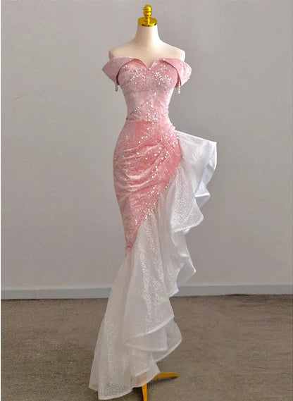 Pink high-low mermaid prom dress with off-shoulder neckline.
