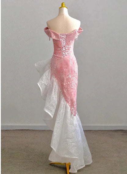 Model wearing a Koutun pink off-shoulder homecoming dress.
