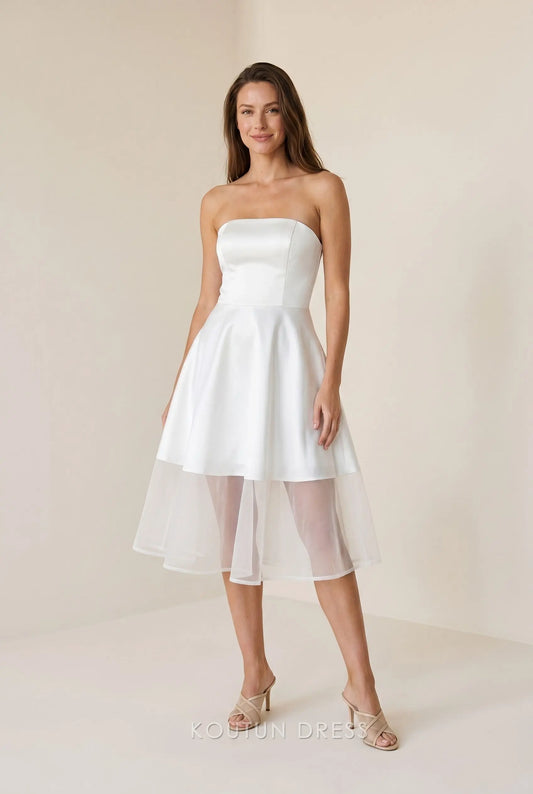 White strapless A-line homecoming dress with satin bodice and tulle skirt.