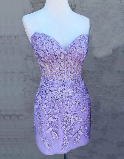 Side view of a pink sweetheart lace short homecoming dress.