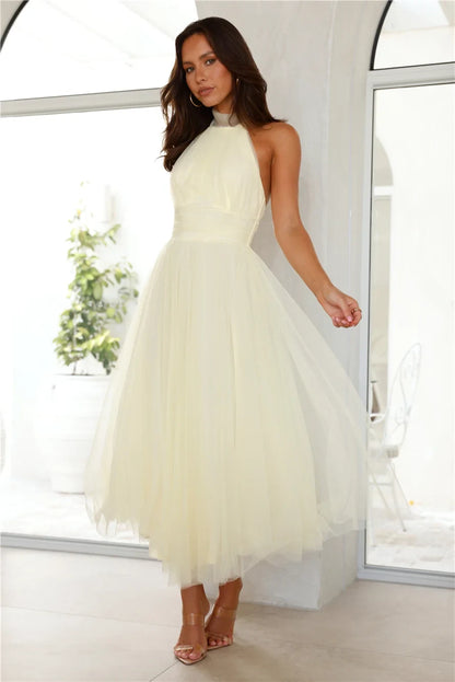 Chic A-Line Halter Sleeveless Backless Tiered Light Yellow Midi Prom Dress