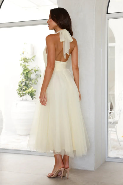 Chic A-Line Halter Sleeveless Backless Tiered Light Yellow Midi Prom Dress