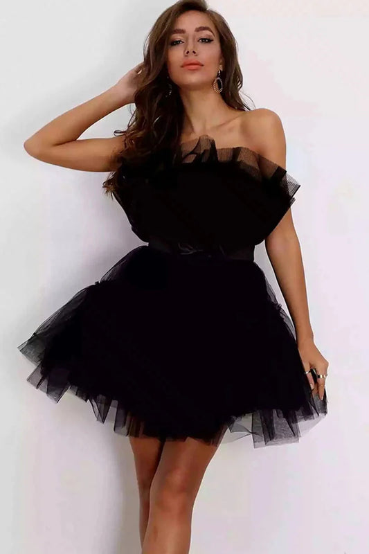 Elegant A-Line strapless black homecoming dress on a model.
