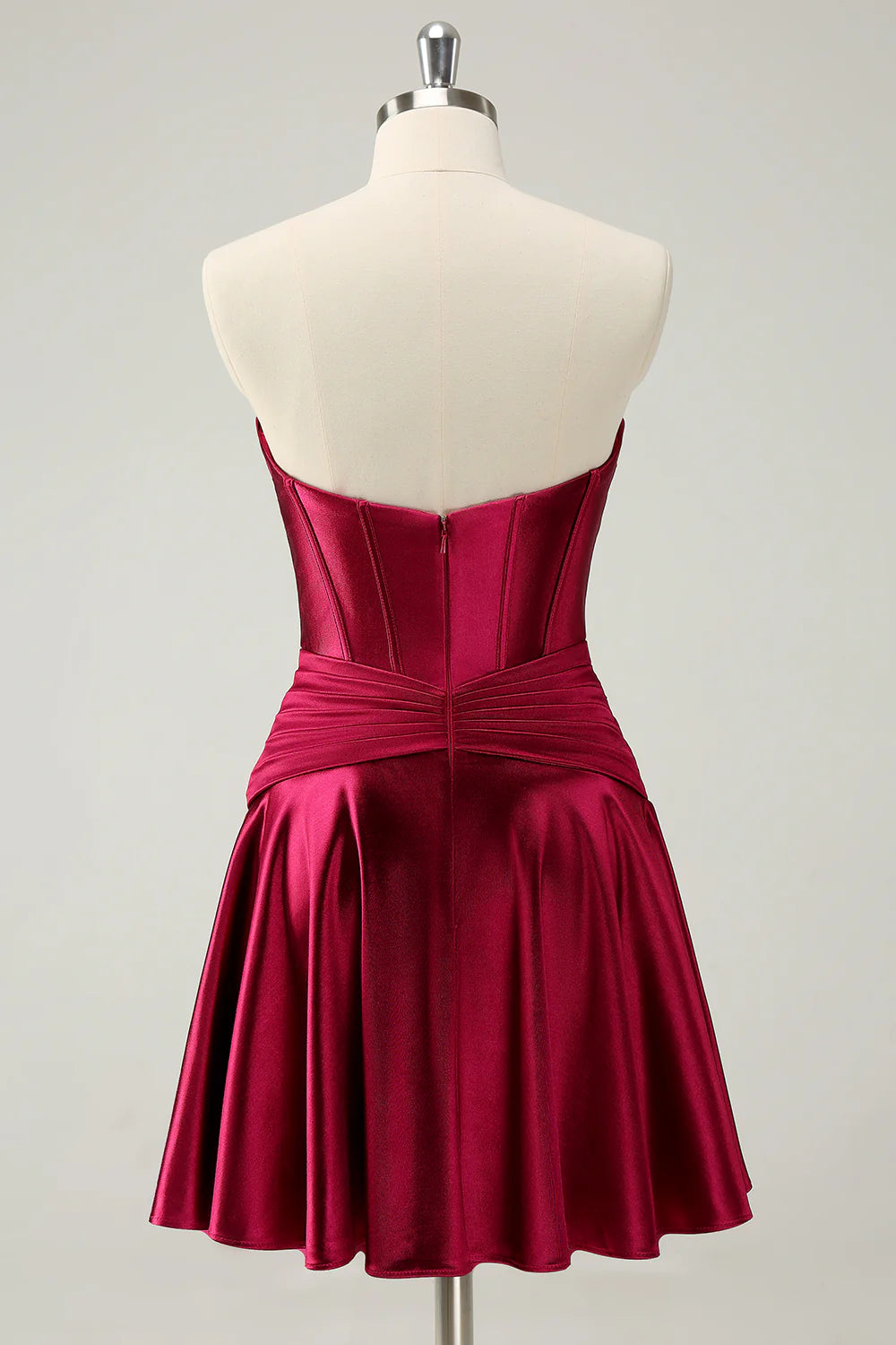Back view of burgundy A-line satin dress with keyhole detail.