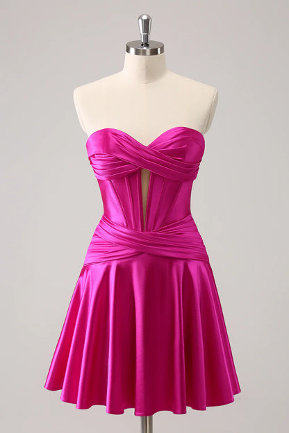 Fuchsia A-line satin homecoming dress with sweetheart strapless neckline.