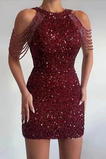 Close-up of the shimmering sequined fabric on a high neck dress.