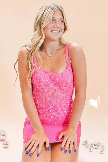 Model wearing a pink sequin lace bodycon short dress with a square neckline.