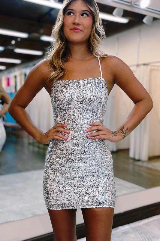 Model wearing a silver sequin bodycon short homecoming dress.