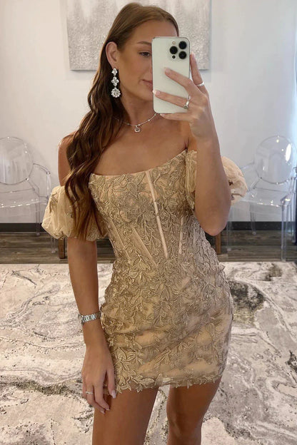 Side view of the gold homecoming dress, highlighting the bodycon fit and appliques.
