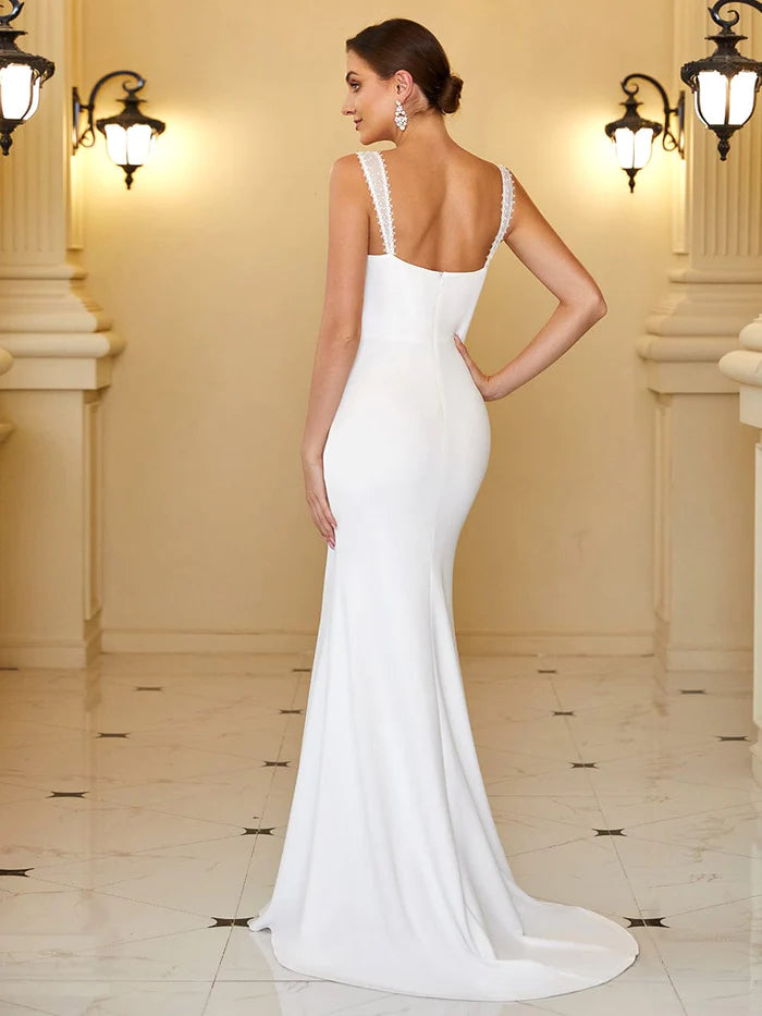 silk bodycon wedding dress SEEMA, Elegant mermaid gown in luxurious silk in slip-style design. Cut to a bodycon silhouette the gown features a straight neckline embellished with pearls spaghetti straps, an open V-back adorned