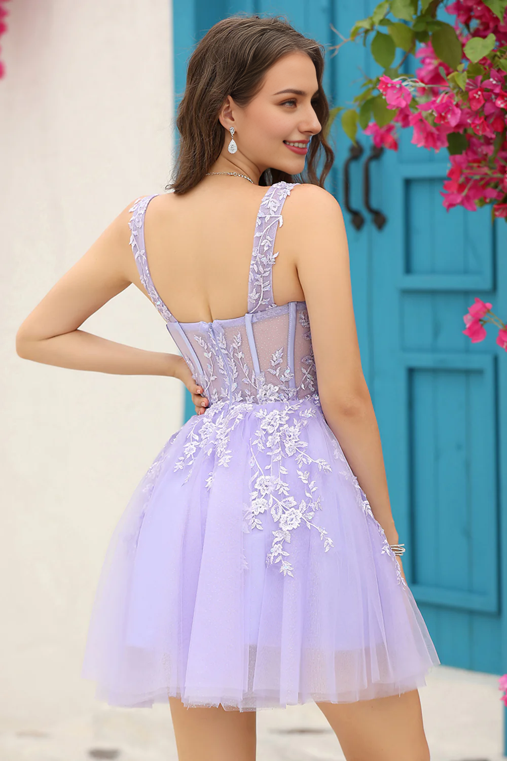 Back view of the lilac lace and tulle homecoming dress.