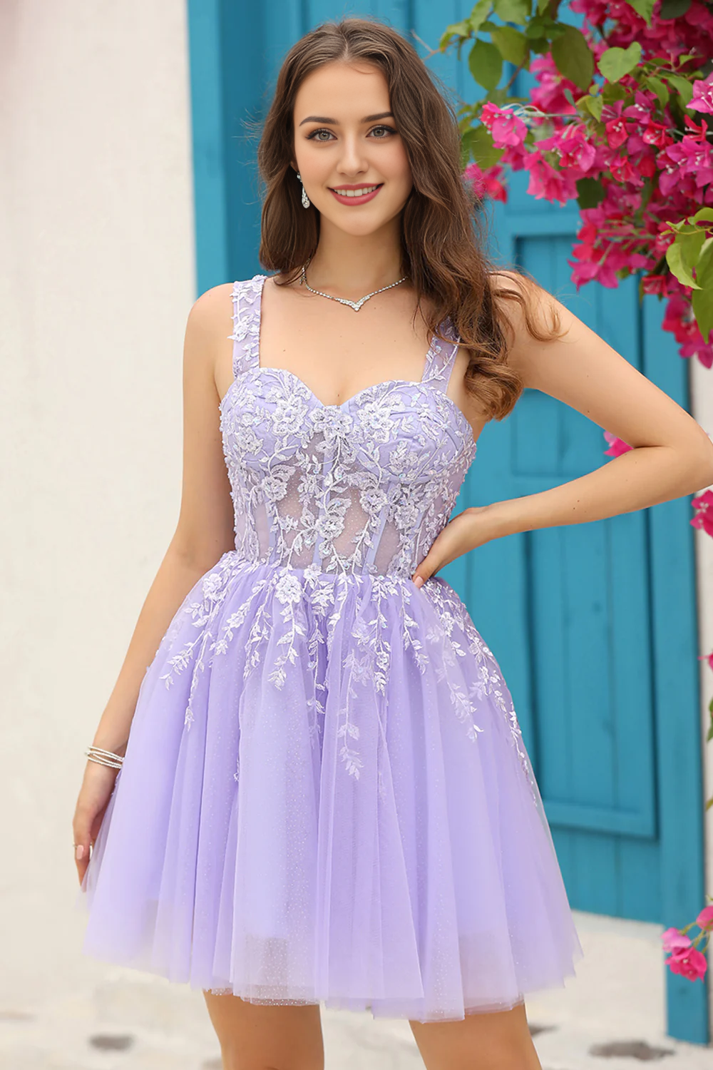 Front view of a woman in the short lilac corset strap dress.