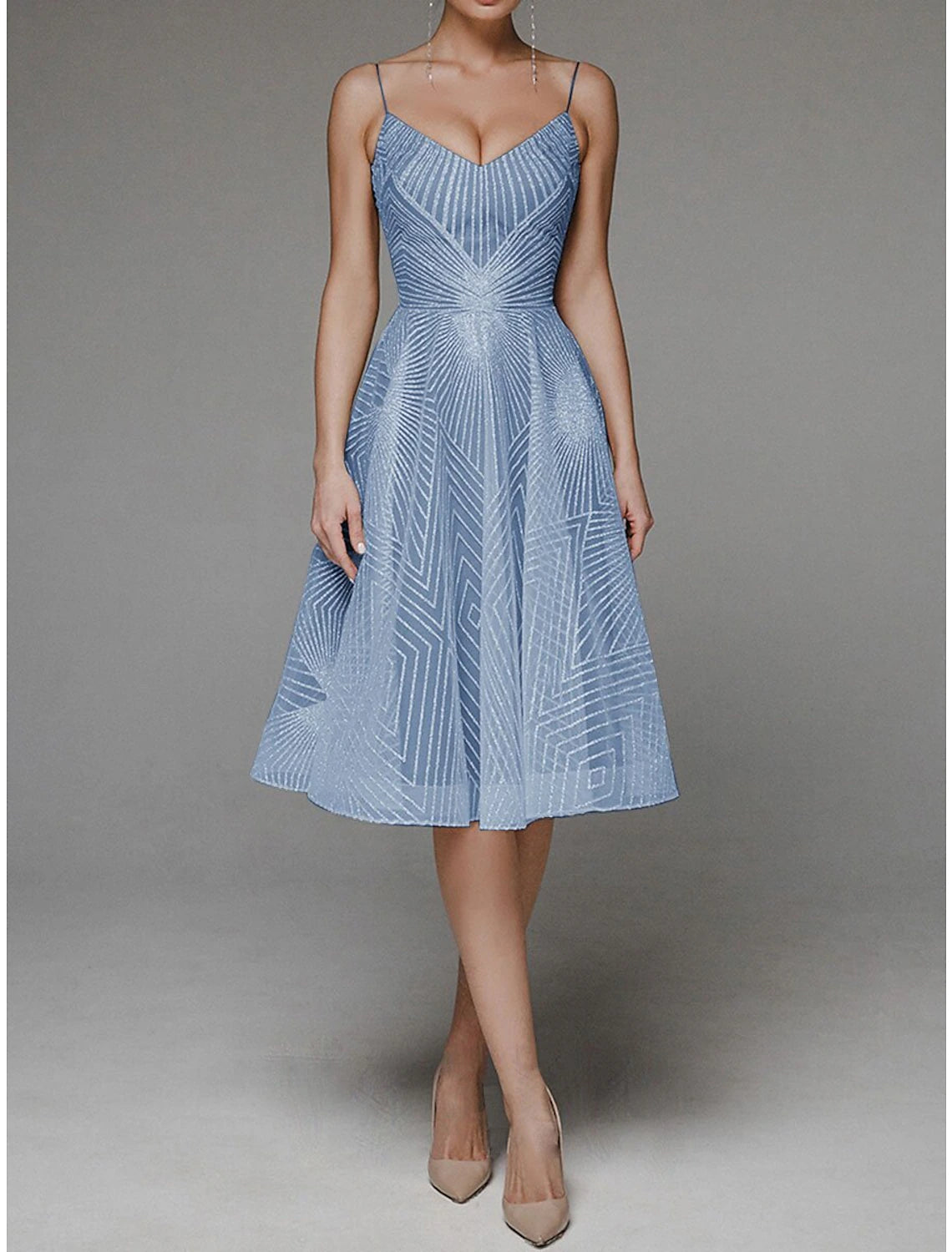 Model wearing the A-Line tea-length dress, side view.