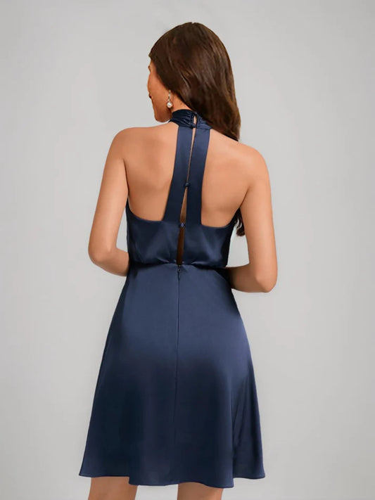 Side view of A-Line halter mini dress.