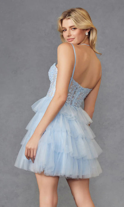 Close-up of the light blue sequin corset bodice and tiered tulle skirt of the homecoming dress.