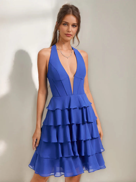 Light blue A-line halter homecoming dress with tiered ruffles.