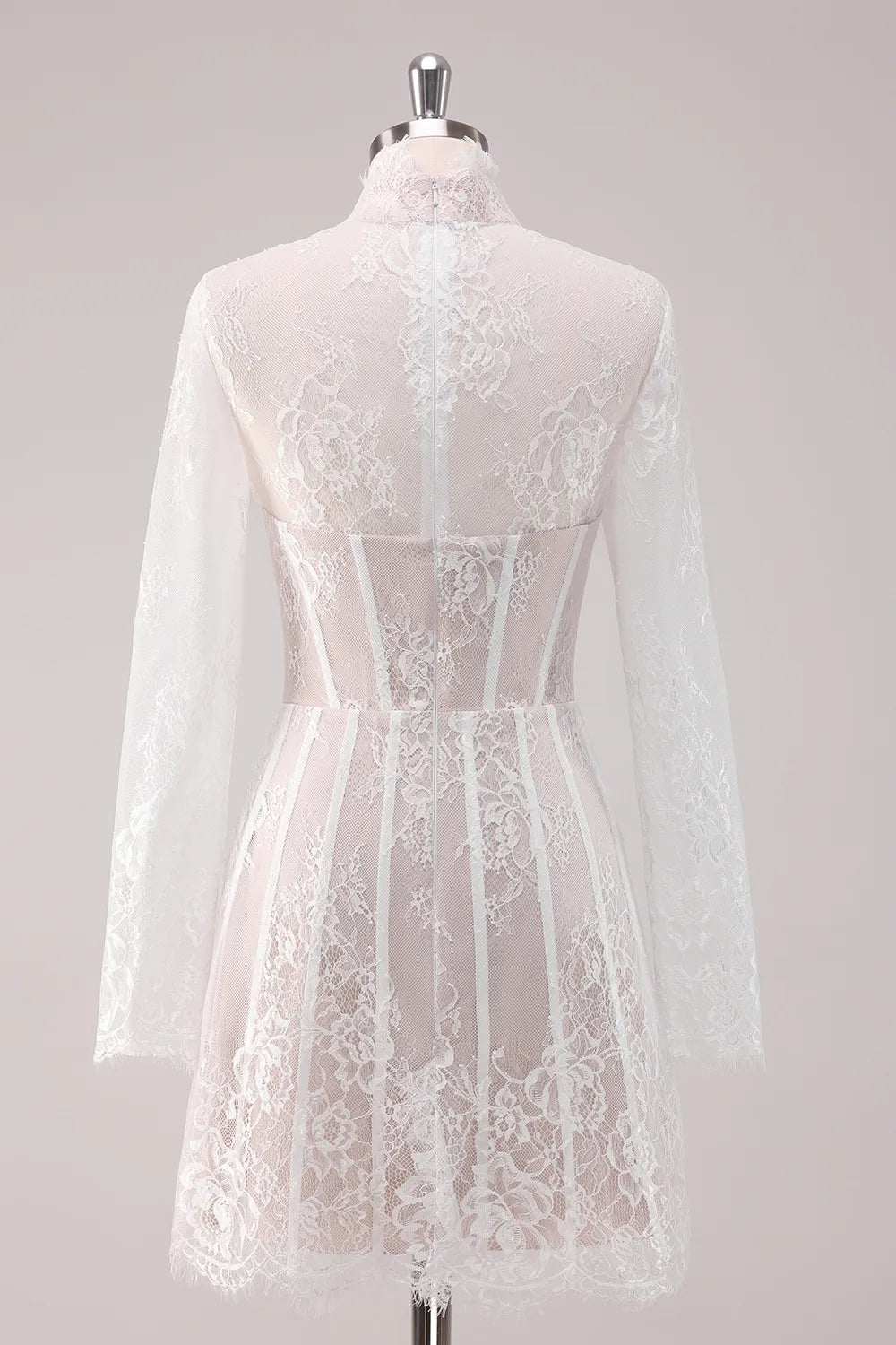 Side view of a white lace high neck long sleeve short dress.