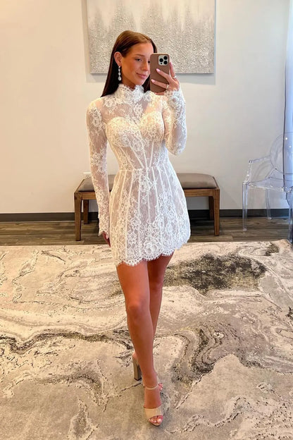 Close-up of the delicate lace fabric on the white high neck dress.