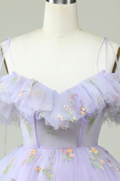 Close-up of the ruffled off-shoulder neckline and corset detail on a lavender dress.