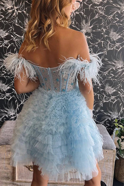 Side view of the light blue off-shoulder dress, highlighting the A-line silhouette.