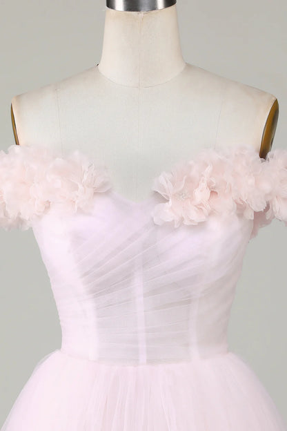 Back view of the pink off-shoulder homecoming dress with a flowing A-line skirt.