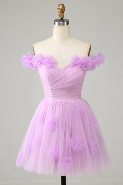 Close-up of the delicate floral details on the pink off-shoulder dress.