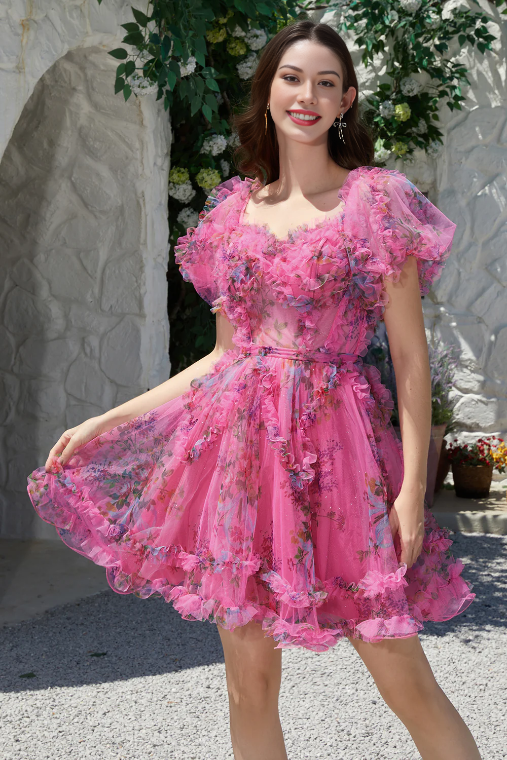 Back view of the fuchsia A-line off-shoulder tulle dress, showing the elegant silhouette.