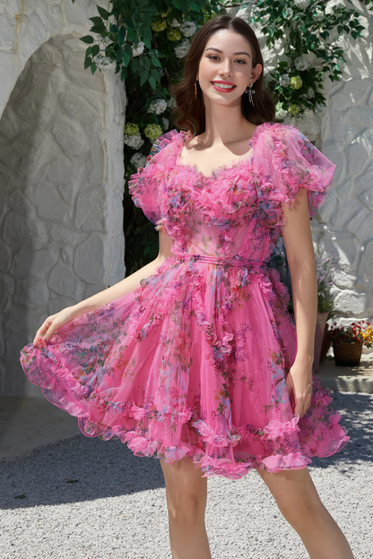 Back view of the fuchsia A-line off-shoulder tulle dress, showing the elegant silhouette.
