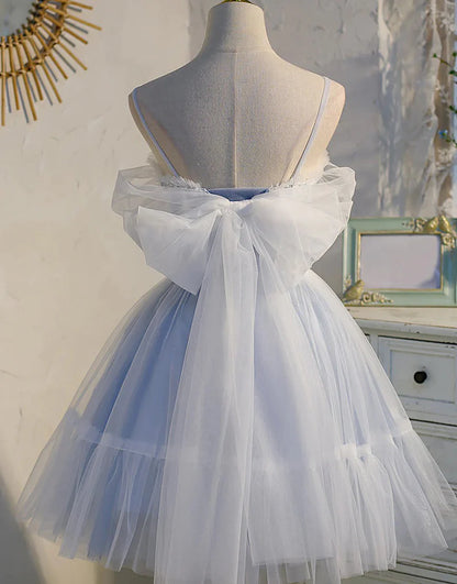 Back view of the blue A-line off-shoulder homecoming dress.