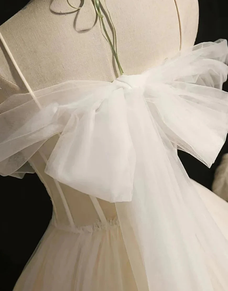 Full length view of the blue A-line tulle dress.
