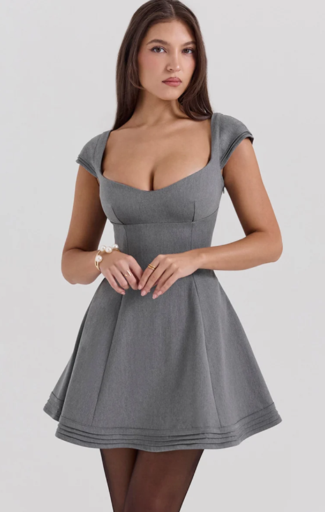 Elegant A-line homecoming dress with a plunge neck and waist-cinching detail.