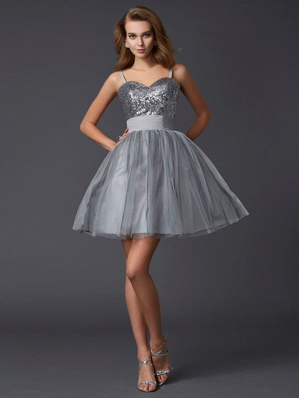 Front view of an A-Line Princess short organza homecoming dress with spaghetti straps.