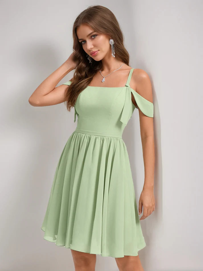 Close-up of the pleated detail on the chiffon homecoming dress.