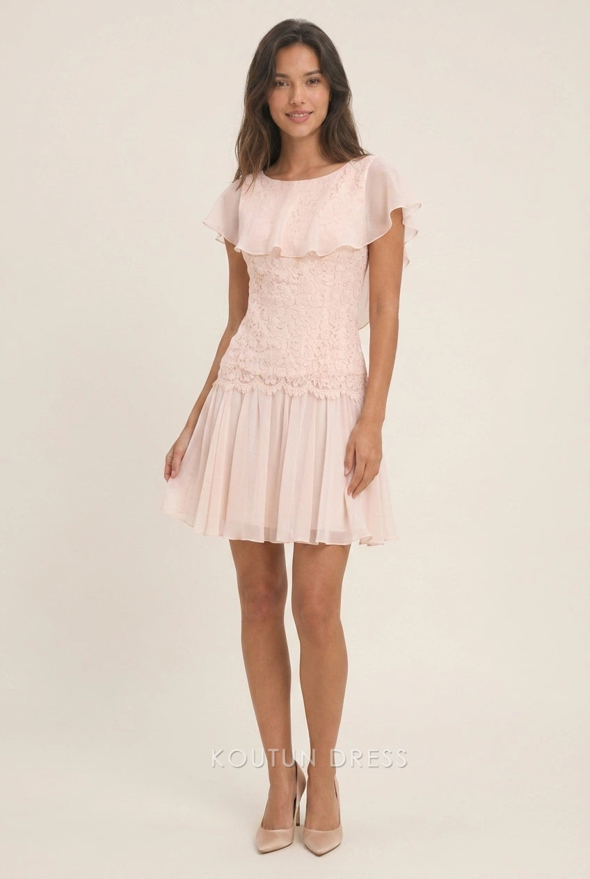 Close-up of lace bodice and ruffled flutter sleeve on blush pink dress.