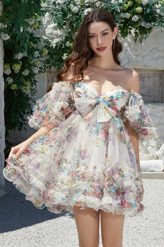 Model wearing an ivory floral A-line short tulle homecoming dress.