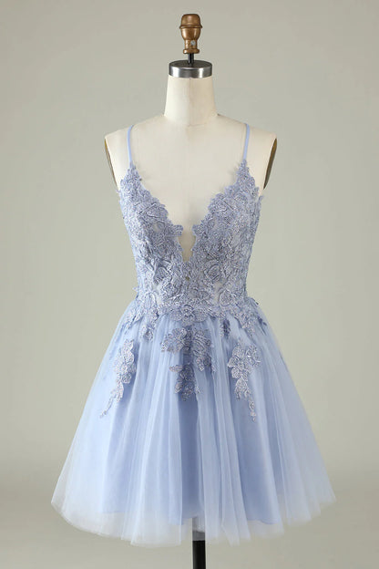 A-line spaghetti strap homecoming dress with appliques.