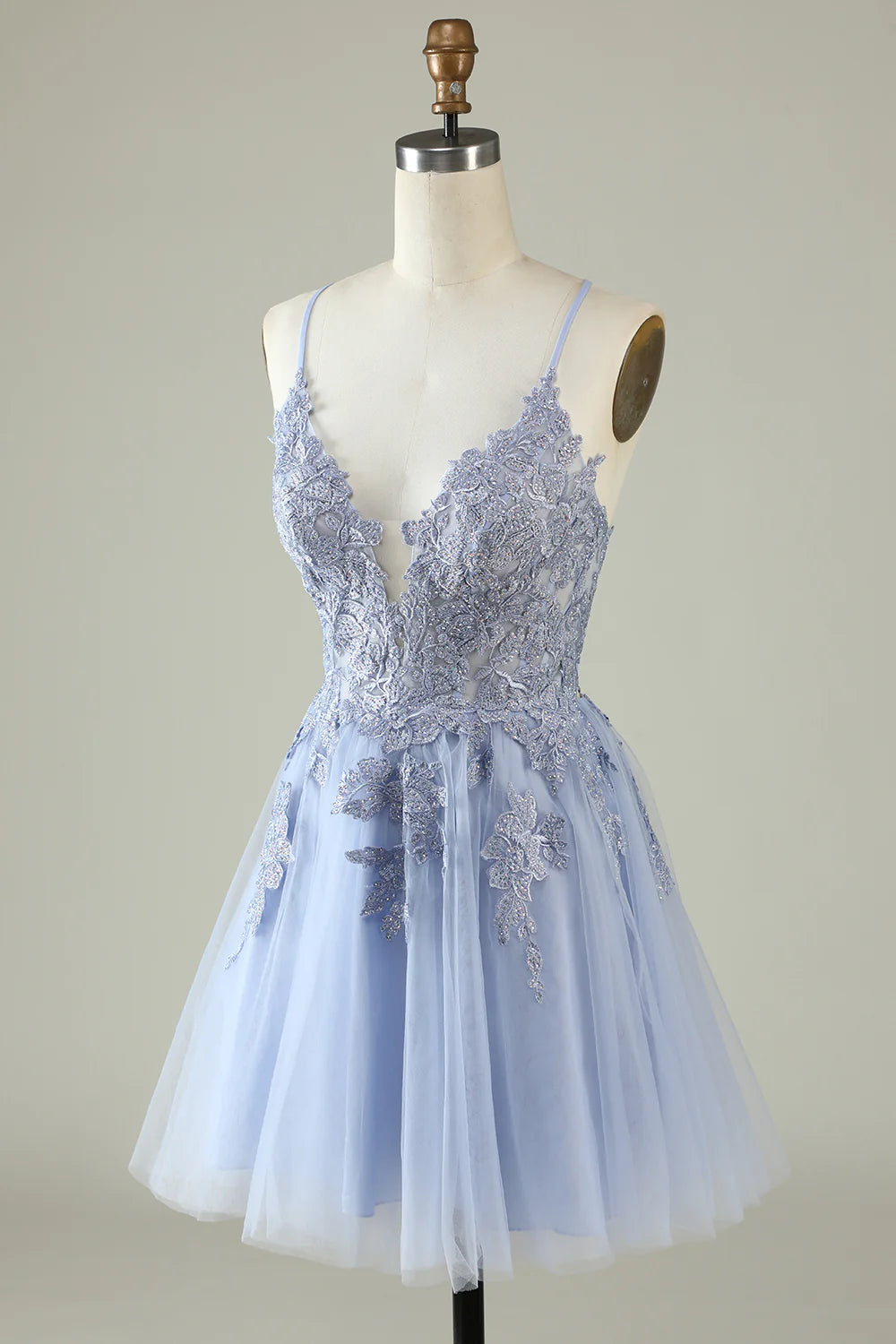 Purple A-line spaghetti strap dress with appliques.