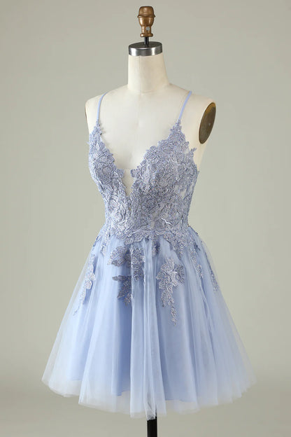 Purple A-line spaghetti strap dress with appliques.