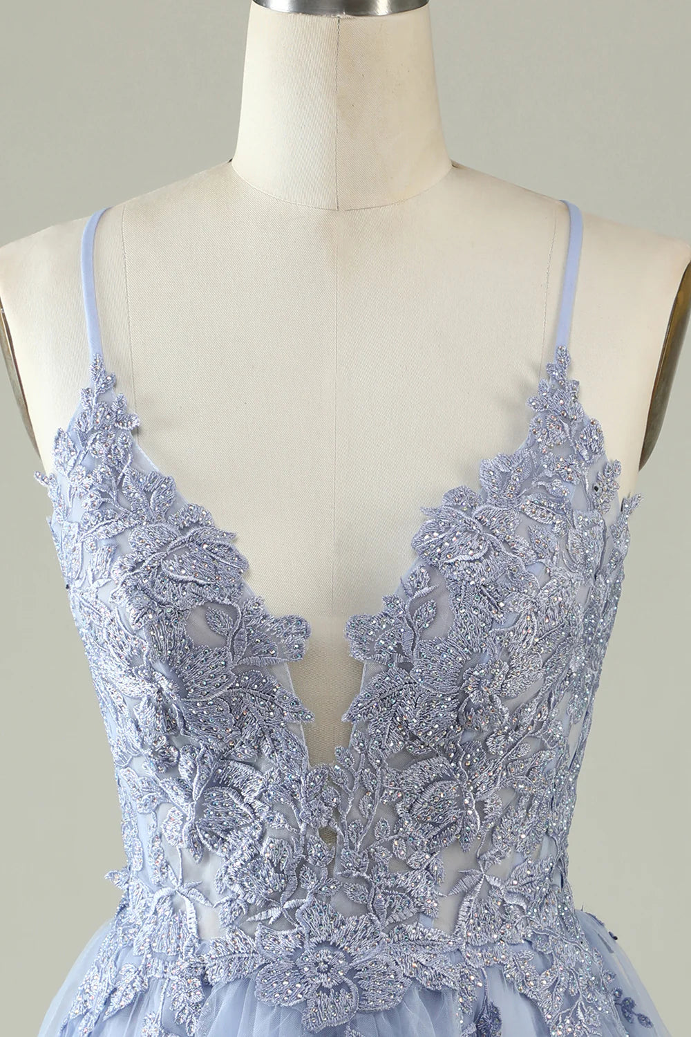 Light purple A-line spaghetti strap dress.
