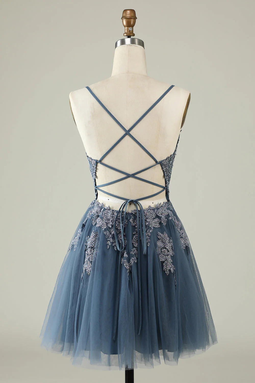 Detailed appliques on a homecoming dress.