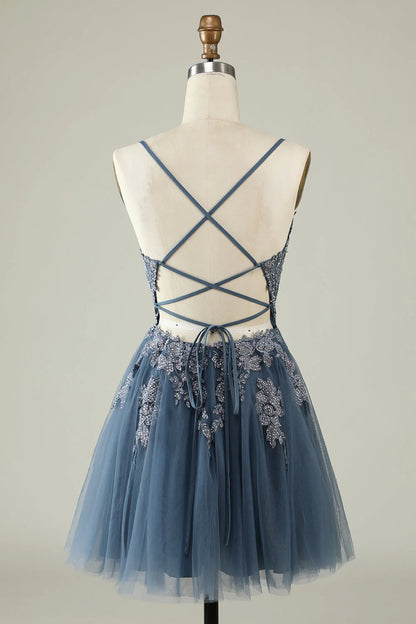 Detailed appliques on a homecoming dress.