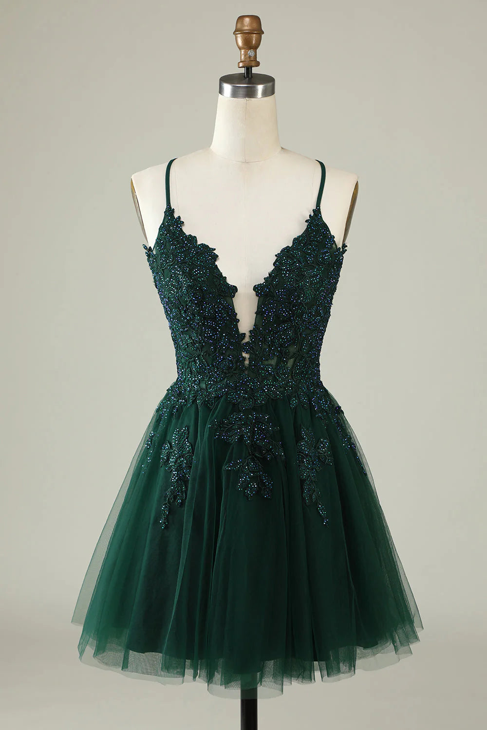 Side profile of an A-line knee-length dress.