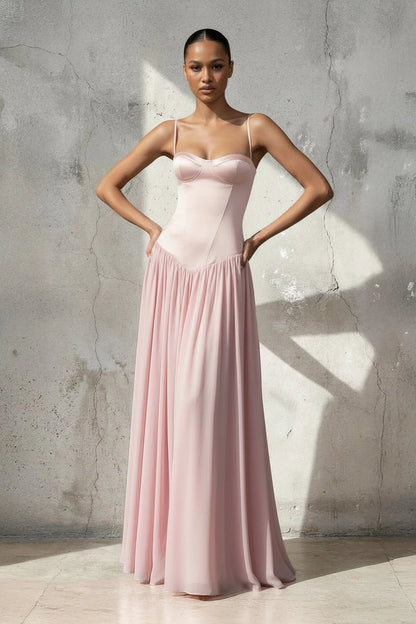 Elegant A-line chiffon gown with spaghetti straps and corset bodice.