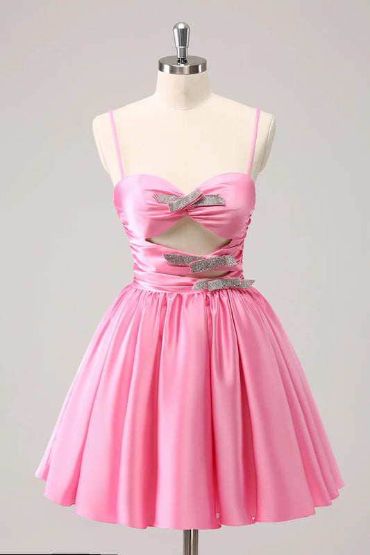 Elegant A-line homecoming dress with spaghetti straps and keyhole detail.