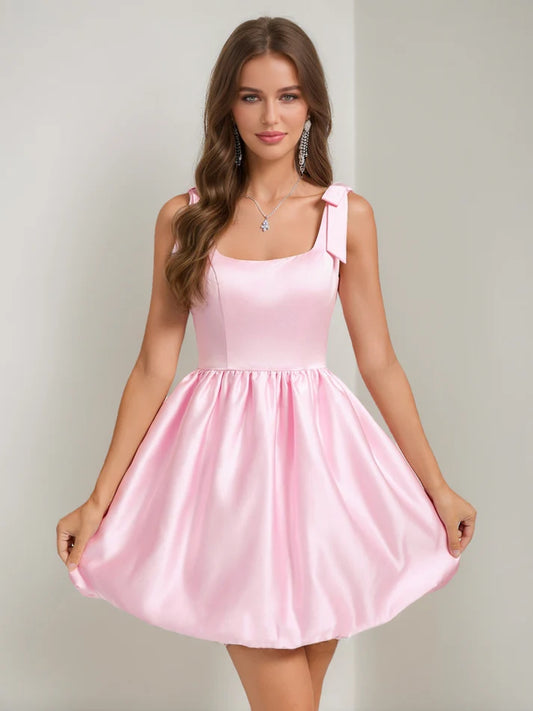 A-Line short homecoming dress with square neckline and bow detail, front view.