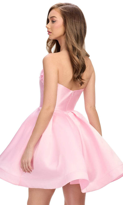 Back view of a strapless satin mini dress with floral details.