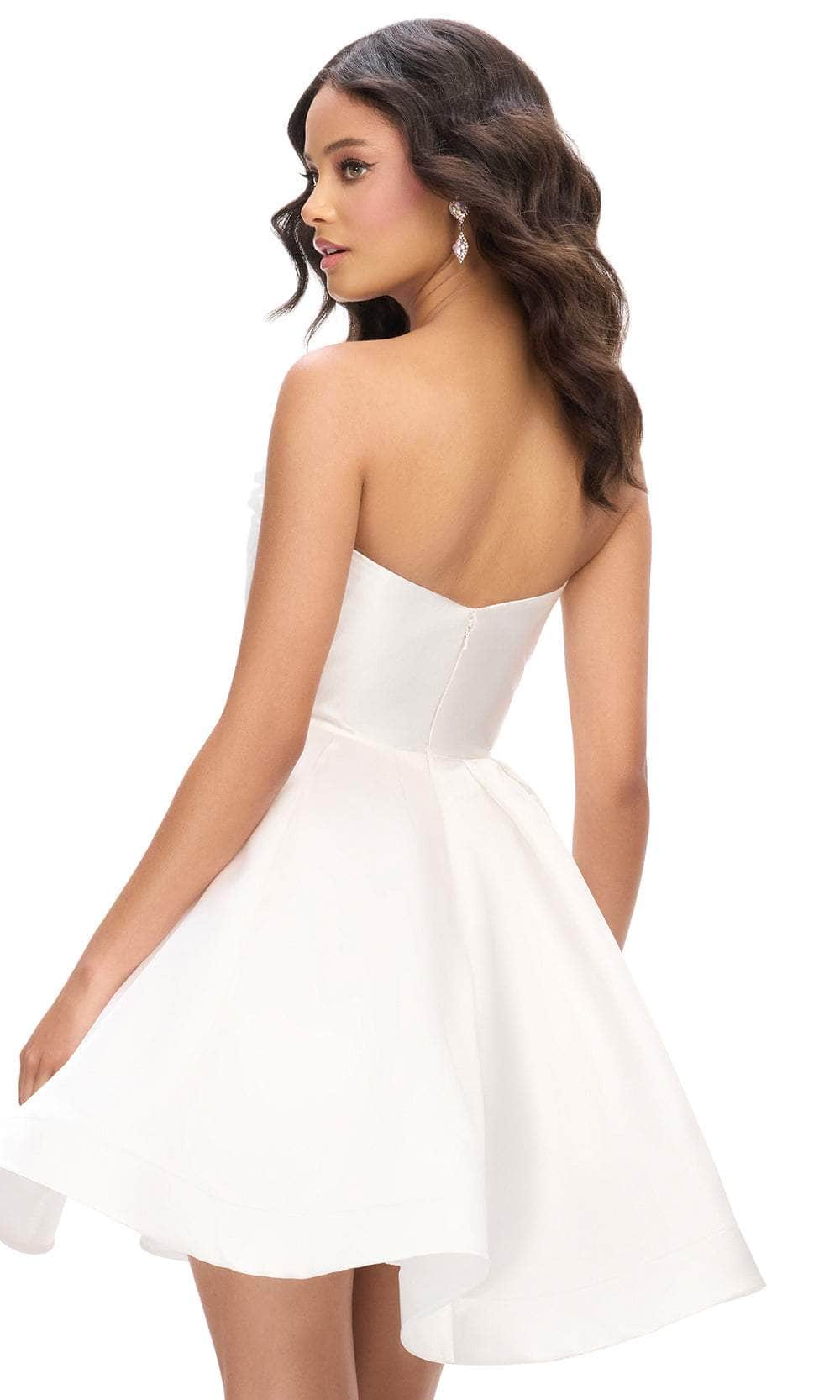 Close-up of the 3D floral appliques on a sweetheart neckline dress.