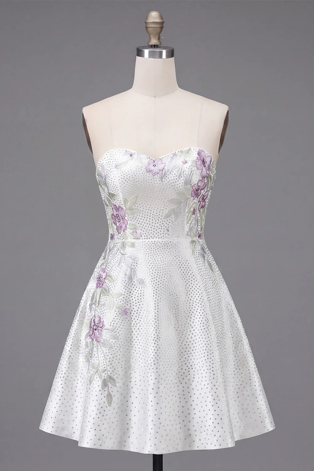Side view of white strapless homecoming dress.