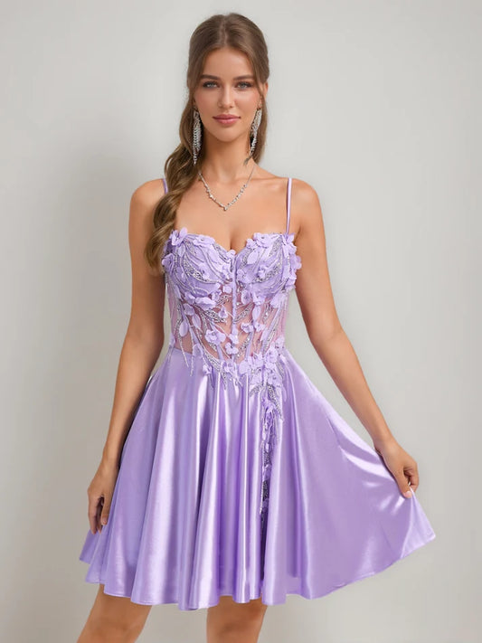 Front view of an A-Line sweetheart short homecoming dress with beading and 3D floral appliques.