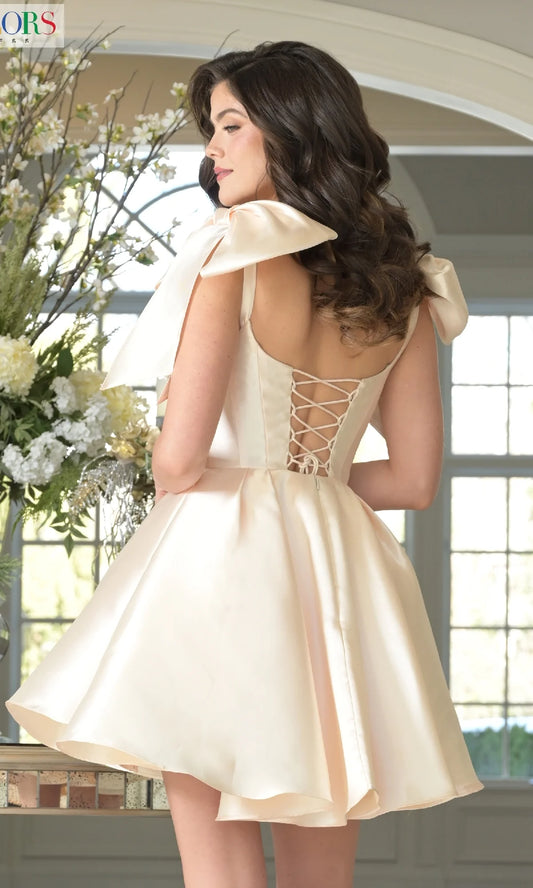 Back view of champagne short formal dress showing lace-up detail.